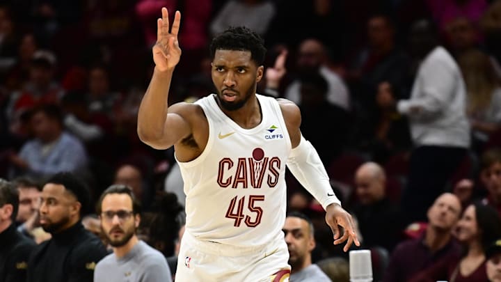 Nov 24, 2024; Cleveland, Ohio, USA; Cleveland Cavaliers guard Donovan Mitchell (45) celebrates after hitting a three point basket during the second half against the Toronto Raptors at Rocket Mortgage FieldHouse. Mandatory Credit: Ken Blaze-Imagn Images