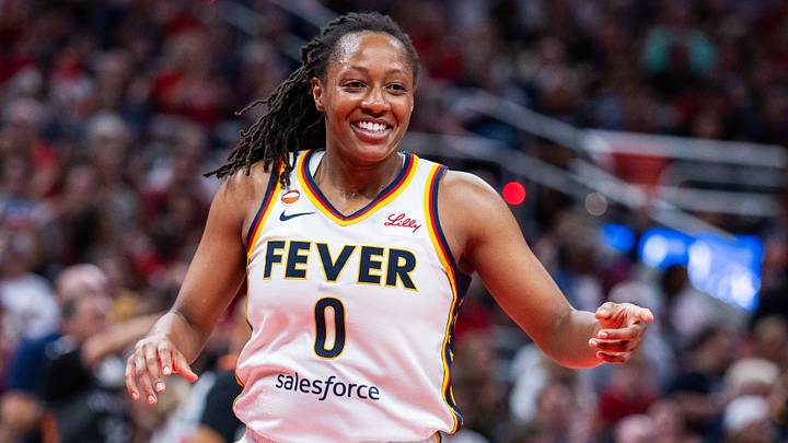 Jul 22, 2026; Indianapolis, Indiana, USA; Indiana Fever guard Kelsey Mitchell (0) celebrates a made shot  in the first half against the Connecticut Sun at Gainbridge Fieldhouse. Mandatory Credit: Trevor Ruszkowski-Imagn Images