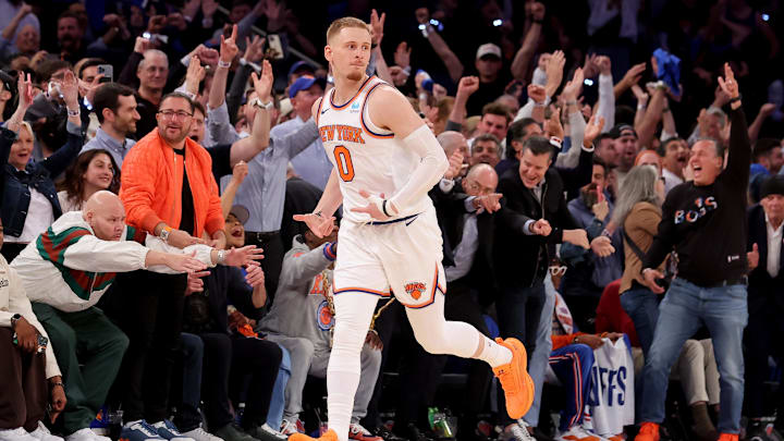 New York Knicks guard Donte DiVincenzo (0) celebrates.
