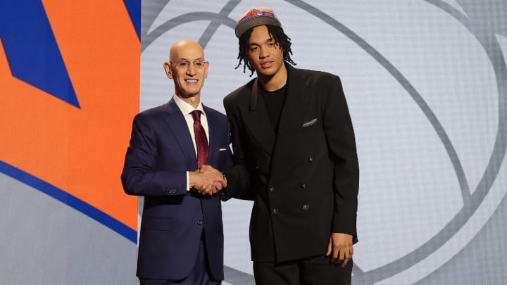 Jun 26, 2024; Brooklyn, NY, USA; Pacome Dadiet poses for photos with NBA commissioner Adam Silver after being selected in the first round by the New York Knicks in the 2024 NBA Draft at Barclays Center. Mandatory Credit: Brad Penner-USA TODAY Sports