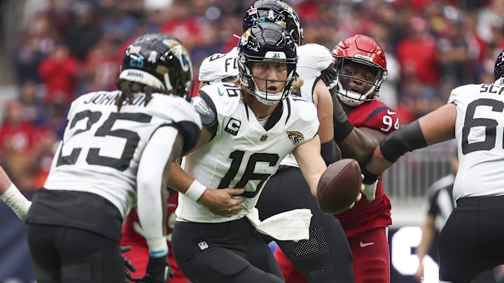 Nov 26, 2023; Houston, Texas, USA; Jacksonville Jaguars quarterback Trevor Lawrence (16) drops back
