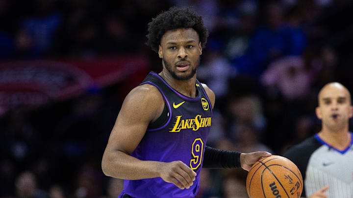 Jan 28, 2025; Philadelphia, Pennsylvania, USA; Los Angeles Lakers guard Bronny James (9) controls the ball against the Philadelphia 76ers at Wells Fargo Center. Mandatory Credit: Bill Streicher-Imagn Images Jan 28, 2025; Philadelphia, Pennsylvania, USA; Los Angeles Lakers guard Bronny James (9) controls the ball against the Philadelphia 76ers at Wells Fargo Center. Mandatory Credit: Bill Streicher-Imagn Images