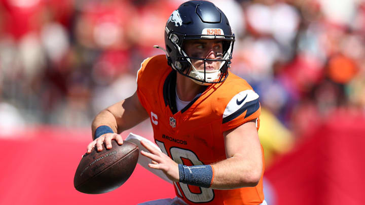Sep 22, 2024; Tampa, Florida, USA; Denver Broncos quarterback Bo Nix (10) drops back to pass against the Tampa Bay Buccaneers in the third quarter at Raymond James Stadium. 