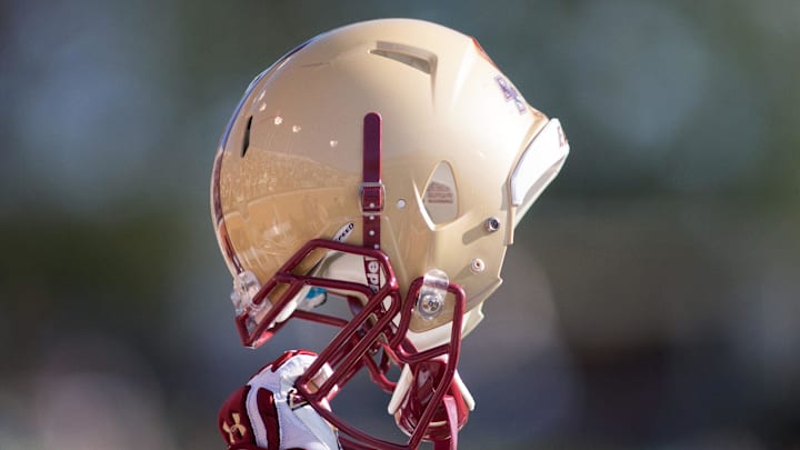 Nov 3, 2012; Winston Salem, NC, USA; A Boston College Eagles player raises his helmet during kickoff in the first quarter against the Wake Forest Demon Deacons at BB&T field.  Mandatory Credit: Jeremy Brevard-Imagn Images