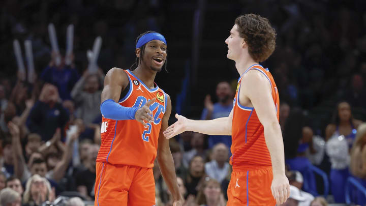 Jan 8, 2023; Oklahoma City, Oklahoma, USA; Oklahoma City Thunder guard Shai Gilgeous-Alexander (2) and Oklahoma City Thunder guard Josh Giddey (3) celebrate after scoring against the Dallas Mavericks during the second half at Paycom Center. Mandatory Credit: Alonzo Adams-USA TODAY Sports Jan 8, 2023; Oklahoma City, Oklahoma, USA; Oklahoma City Thunder guard Shai Gilgeous-Alexander (2) and Oklahoma City Thunder guard Josh Giddey (3) celebrate after scoring against the Dallas Mavericks during the second half at Paycom Center. Mandatory Credit: Alonzo Adams-USA TODAY Sports