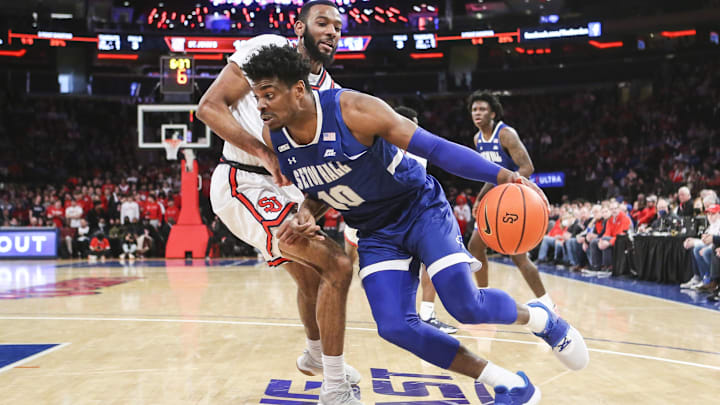 Jan 22, 2022; New York, New York, USA; Seton Hall Pirates forward Alexis Yetna (10) drives past St. Johns.
