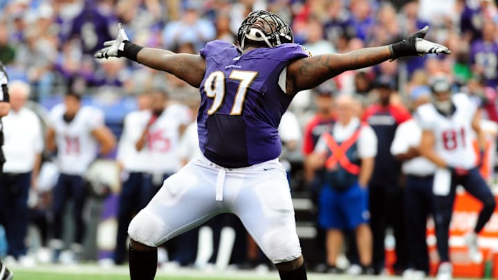 Sep 22, 2013; Baltimore, MD, USA; Baltimore Ravens defensive tackle Arthur Jones (97) celebrates after recording a sack in the fourth quarter against the Houston Texans at M&T Bank Stadium. Mandatory Credit: Evan Habeeb-Imagn Images Sep 22, 2013; Baltimore, MD, USA; Baltimore Ravens defensive tackle Arthur Jones (97) celebrates after recording a sack in the fourth quarter against the Houston Texans at M&T Bank Stadium. Mandatory Credit: Evan Habeeb-Imagn Images