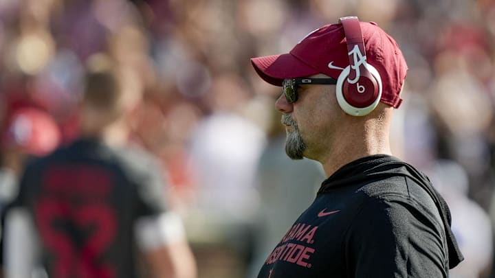 Nov 15, 2025; Tuscaloosa, Alabama, USA; Alabama offensive coordinator Ryan Grubb watches the Crimson Tide stretch before the game with Oklahoma at Saban Field at Bryant-Denny Stadium at Saban Field at Bryant-Denny Stadium. Mandatory Credit: Gary Cosby