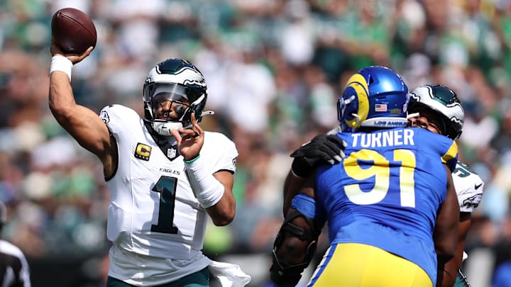 Jalen Hurts threw a season high 32 times Sunday and had his first three touchdown passes of the year.