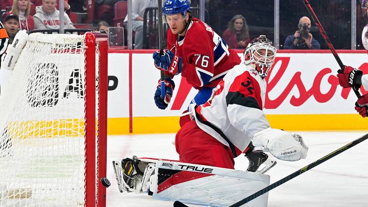 Oct 6, 2026; Montreal, Quebec, CAN;  Montreal Canadiens forward Zachary Bolduc (76) scores a goal against Carolina Hurricanes goalie Brandon Bussi (32) during the first period at the Bell Centre.  Mandatory Credit: Eric Bolte-Imagn Images