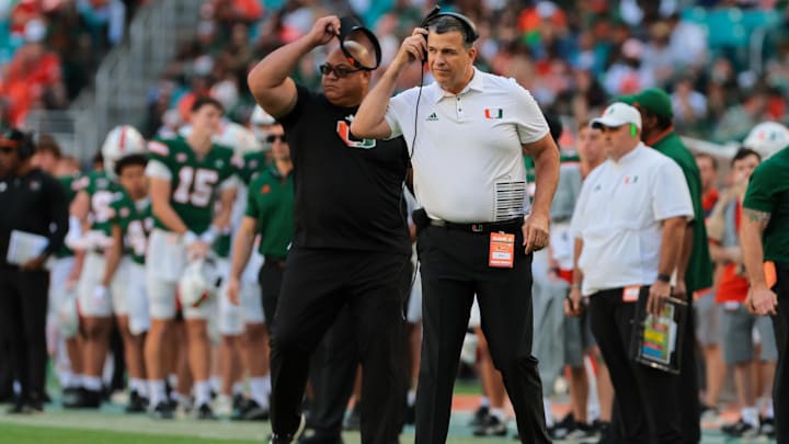 Nov 23, 2024; Miami Gardens, Florida, USA; Miami Hurricanes head coach Mario Cristobal look son from the sideline against the Wake Forest Demon Deacons during the second quarter at Hard Rock Stadium. Mandatory Credit: Sam Navarro-Imagn Images