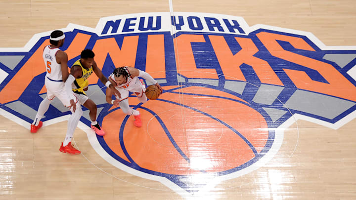 New York Knicks forward Achiuwa (5) sets a pick against Indiana Pacers guard Mathurin or Knicks guard Brunson during the Eastern Conference finals.