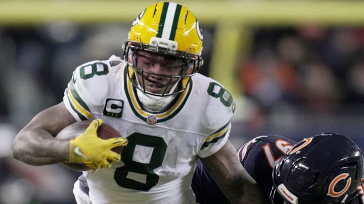 Green Bay Packers running back Josh Jacobs (8) is tackled by Chicago Bears defensive tackle Andrew Billings (97) during the second quarter of their wild card playoff game Saturday, January 10, 2026 at Soldier Field in Chicago, Illinois.