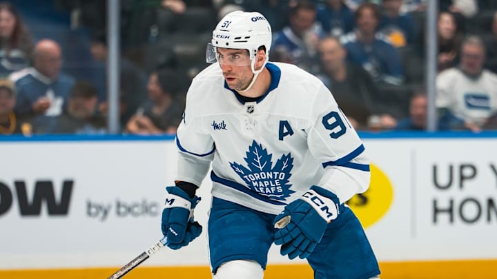 Jan 31, 2026; Vancouver, British Columbia, CAN; Toronto Maple Leafs forward John Tavares (91) skates against the Toronto Maple Leafs in the first period at Rogers Arena. Mandatory Credit: Bob Frid-Imagn Images