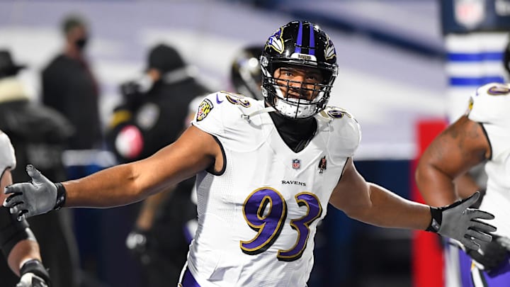 Jan 16, 2021; Orchard Park, New York, USA; Baltimore Ravens defensive end Calais Campbell (93) gestures while jogging on the field prior to an AFC Divisional Round game against the Buffalo Bills at Bills Stadium. Mandatory Credit: Rich Barnes-Imagn Images