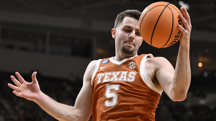 Texas Longhorns forward Camden Heide rebounds the ball against the Purdue Boilermakers in the second half during a Sweet Sixteen game of the West Regional of the men's 2026 NCAA Tournament at SAP Center. 