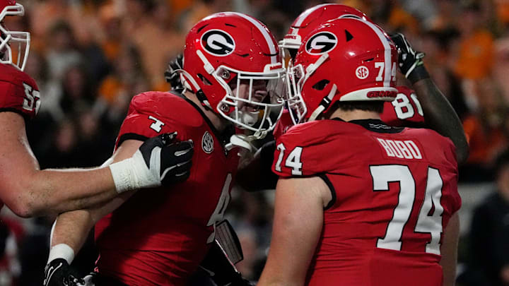 Georgia tight end Oscar Delp (4) celebrates with his teammates after scoring touchdown during the first half of a NCAA college football game against Tennessee in Athens, Ga., on Saturday, Nov. 16, 2024.