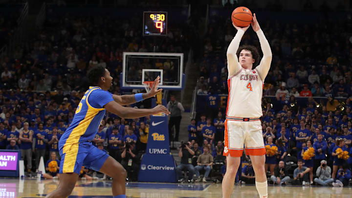 Jan 18, 2025; Pittsburgh, Pennsylvania, USA; Clemson Tigers forward Ian Schieffelin (4) shoots a three point basket against the Pittsburgh Panthers during the first half at the Petersen Events Center. Mandatory Credit: Charles LeClaire-Imagn Images