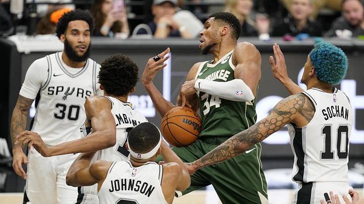 Jan 31, 2025; San Antonio, Texas, USA; Milwaukee Bucks forward Giannis Antetokounmpo (34) loses the ball while driving to the basket against San Antonio Spurs center Victor Wembanyama (1) and forward Jeremy Sochan (10) during the second half at Frost Bank Center. Mandatory Credit: Scott Wachter-Imagn Images Jan 31, 2025; San Antonio, Texas, USA; Milwaukee Bucks forward Giannis Antetokounmpo (34) loses the ball while driving to the basket against San Antonio Spurs center Victor Wembanyama (1) and forward Jeremy Sochan (10) during the second half at Frost Bank Center. Mandatory Credit: Scott Wachter-Imagn Images