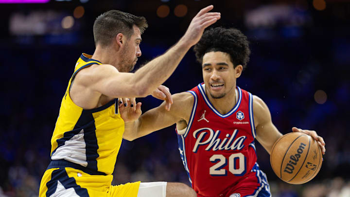 Dec 13, 2024; Philadelphia, Pennsylvania, USA; Philadelphia 76ers guard Jared McCain (20) and Indiana Pacers guard T.J. McConnell (9) in action at Wells Fargo Center. Mandatory Credit: Bill Streicher-Imagn Images