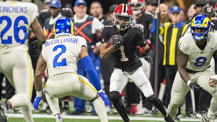 Dec 29, 2025; Atlanta, Georgia, USA; Atlanta Falcons wide receiver Darnell Mooney (1) runs after a catch against Los Angeles Rams safety Jaylen McCollough (2) during the first quarter at Mercedes-Benz Stadium. Mandatory Credit: Dale Zanine-Imagn Images Dec 29, 2025; Atlanta, Georgia, USA; Atlanta Falcons wide receiver Darnell Mooney (1) runs after a catch against Los Angeles Rams safety Jaylen McCollough (2) during the first quarter at Mercedes-Benz Stadium. Mandatory Credit: Dale Zanine-Imagn Images