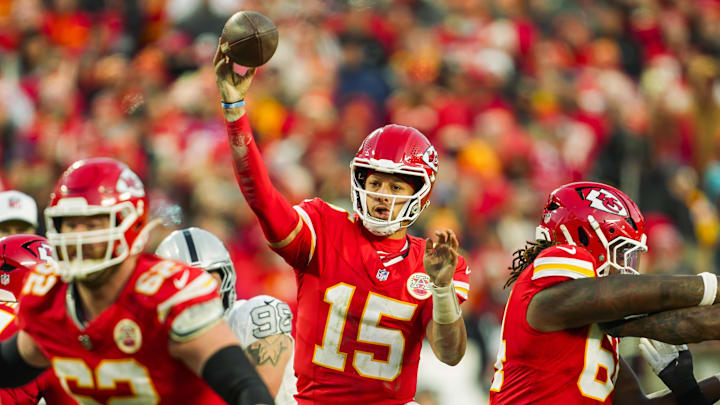 Nov 29, 2024; Kansas City, Missouri, USA; Kansas City Chiefs quarterback Patrick Mahomes (15) throws a pass during the second half against the Las Vegas Raiders at GEHA Field at Arrowhead Stadium. Mandatory Credit: Jay Biggerstaff-Imagn Images