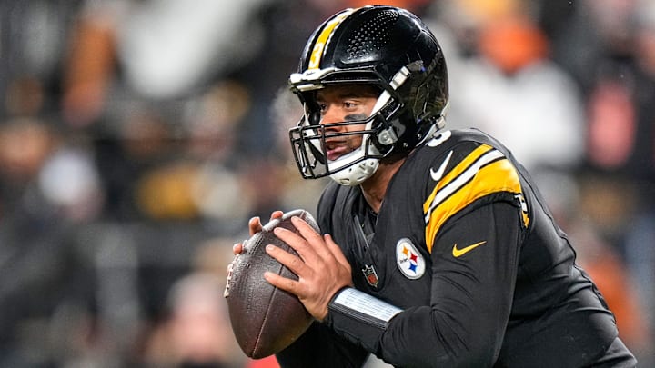 Pittsburgh Steelers quarterback Russell Wilson scrambles out of the pocket in the fourth quarter against the Cincinnati Bengals at Acrisure Stadium. Pittsburgh Steelers quarterback Russell Wilson scrambles out of the pocket in the fourth quarter against the Cincinnati Bengals at Acrisure Stadium.