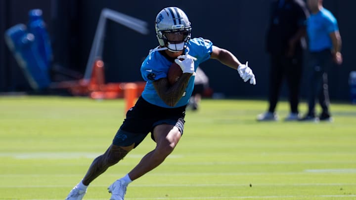 Jul 23, 2025; Charlotte, NC, USA; Carolina Panthers wide receiver Tetairoa McMillan (4) runs with the ball during Panthers Training Camp. Jul 23, 2025; Charlotte, NC, USA; Carolina Panthers wide receiver Tetairoa McMillan (4) runs with the ball during Panthers Training Camp.