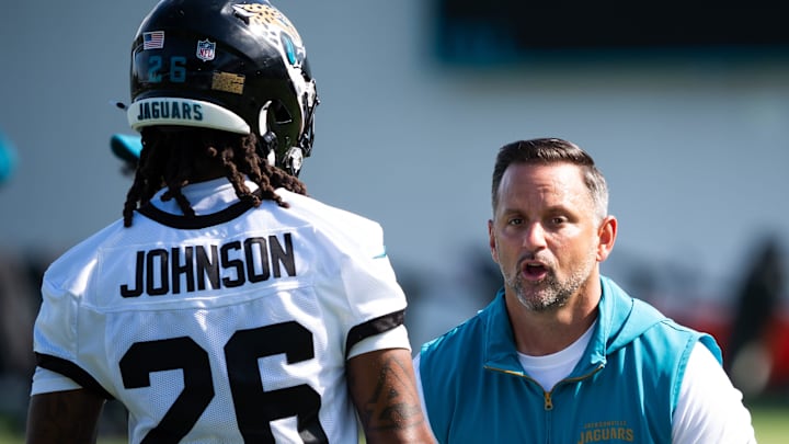 Jacksonville Jaguars defensive coordinator Anthony Campanile coaches up Jacksonville Jaguars safety Antonio Johnson (26) during the Jacksonville Jaguars’ third mandatory minicamp Thursday June 12, 2025 at the Miller Electric Center in Jacksonville, Fla. [Doug Engle/Florida Times-Union]