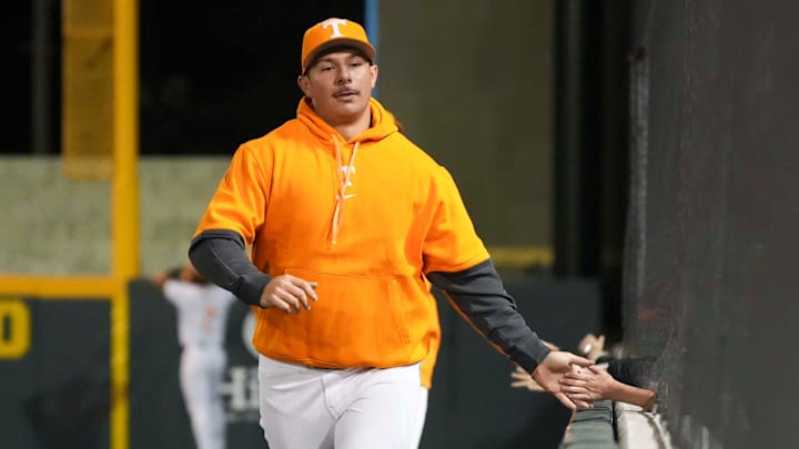 Tennessee first baseman Alberto Osuna (45) high-fives fans during a NCAA baseball game between Tennessee and St. Bonaventure at Lindsey Nelson Stadium on Friday, March 6, 2025.