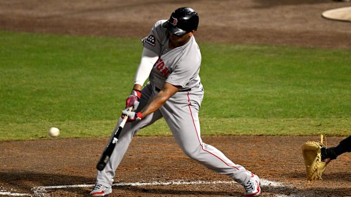 Apr 16, 2025; St. Petersburg, Florida, USA; Boston Red Sox designated hitter Rafael Devers (11) hits a single in the fifth inning against the Tampa Bay Rays at George M. Steinbrenner Field. Mandatory Credit: Jonathan Dyer-Imagn Images Apr 16, 2025; St. Petersburg, Florida, USA; Boston Red Sox designated hitter Rafael Devers (11) hits a single in the fifth inning against the Tampa Bay Rays at George M. Steinbrenner Field. Mandatory Credit: Jonathan Dyer-Imagn Images