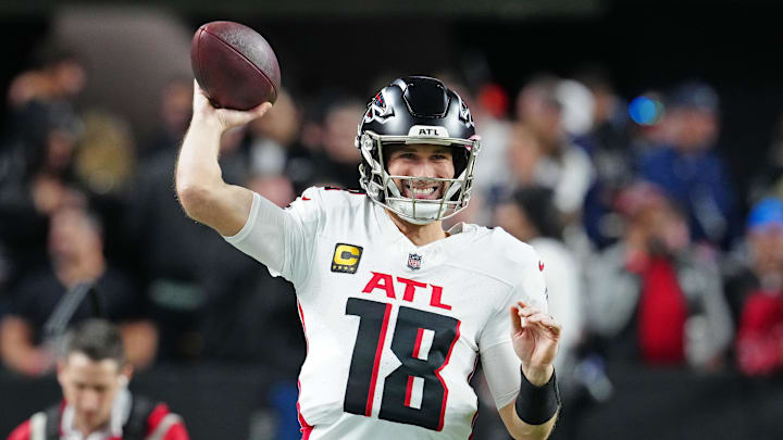 Dec 16, 2024; Paradise, Nevada, USA; Atlanta Falcons quarterback Kirk Cousins (18) warms up before a game against the Las Vegas Raiders at Allegiant Stadium. Mandatory Credit: Stephen R. Sylvanie-Imagn Images