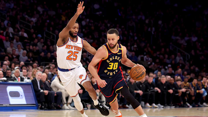 Mar 4, 2025; New York, New York, USA; Golden State Warriors guard Stephen Curry (30) drives to the basket against New York Knicks forward Mikal Bridges (25) during the second quarter at Madison Square Garden. Mandatory Credit: Brad Penner-Imagn Images