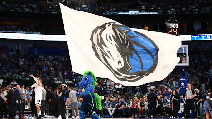Mar 6, 2020; Dallas, Texas, USA;  Dallas Mavericks mascot Champ waves the team flag prior to the game against the Memphis Grizzlies at the American Airlines Center. Mandatory Credit: Matthew Emmons-Imagn Images