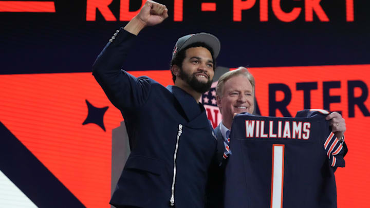 Caleb Williams poses with commissioner Roger Goodell at last year's draft. One accurate mock draft sees controversy ahead for the Bears in this year's draft.