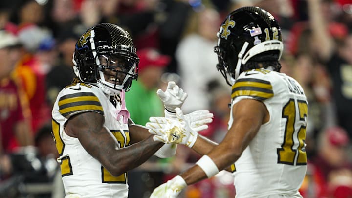 Oct 7, 2024; Kansas City, Missouri, USA; New Orleans Saints wide receiver Rashid Shaheed (22) celebrates with wide receiver Chris Olave (12) after scoring a touchdown during the first half against the Kansas City Chiefs at GEHA Field at Arrowhead Stadium. Mandatory Credit: Jay Biggerstaff-Imagn Images Oct 7, 2024; Kansas City, Missouri, USA; New Orleans Saints wide receiver Rashid Shaheed (22) celebrates with wide receiver Chris Olave (12) after scoring a touchdown during the first half against the Kansas City Chiefs at GEHA Field at Arrowhead Stadium. Mandatory Credit: Jay Biggerstaff-Imagn Images
