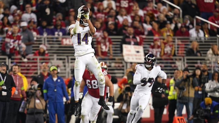 Dec 25, 2023; Santa Clara, California, USA; Baltimore Ravens safety Kyle Hamilton (14) intercepts a