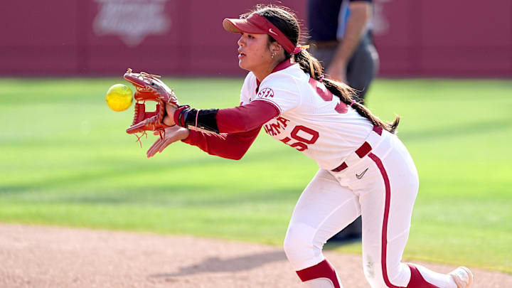 Oklahoma second baseman Ailana Agbayani makes a defensive play in the 2025 NCAA Tournament.