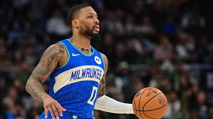 Feb 12, 2024; Milwaukee, Wisconsin, USA; Milwaukee Bucks guard Damian Lillard (0) brings the ball