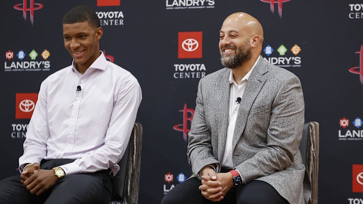 Jun 24, 2022; Houston, Texas, USA; Houston Rockets first-round draft pick Jabari Smith Jr. and general manager Rafael Stone smile during a press conference at Toyota Center. Mandatory Credit: Troy Taormina-Imagn Images