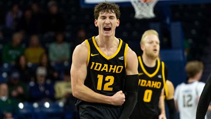 Dec 10, 2025; South Bend, Indiana, USA; Idaho Vandals forward Jackson Rasmussen (12) celebrates after hitting a 3-point shot against the Notre Dame Fighting Irish during the first half at Purcell Pavilion at the Joyce Center. Mandatory Credit: Michael Caterina-Imagn Images