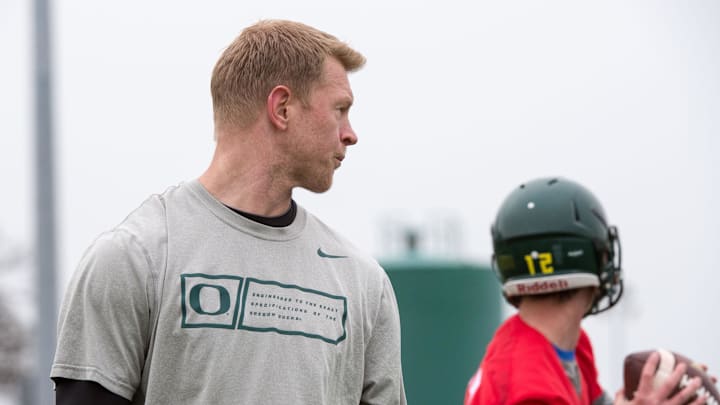 Jan 10, 2015; Euless, TX, USA; Oregon Ducks offensive coordinator Scott Frost watches his team during practice at the Euless Trinity High School football field. Mandatory Credit: Jerome Miron-Imagn Images