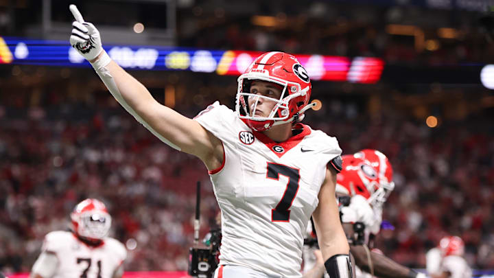 Dec 6, 2025; Atlanta, GA, USA; Georgia Bulldogs tight end Lawson Luckie (7) celebrates after a touchdown during the third quarter against the Alabama Crimson Tide during the 2025 SEC Championship game at Mercedes-Benz Stadium. Mandatory Credit: Brett Davis-Imagn Images