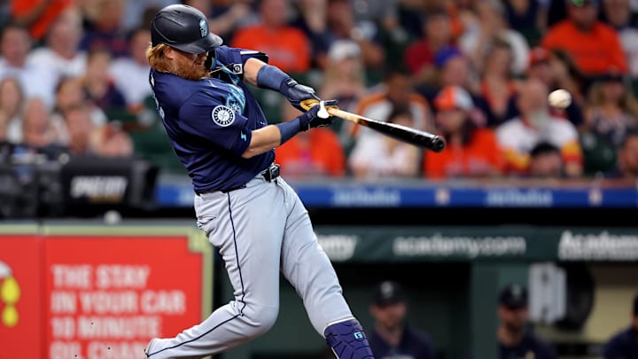 Seattle Mariners first baseman Justin Turner hits a two-RBI single during a game against the Houston Astros on Wednesday at Minute Maid Park.