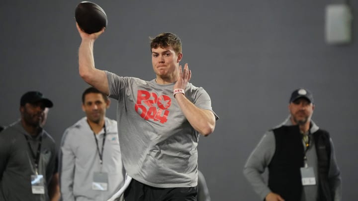 Mar 20, 2024; Columbus, Ohio, USA; Ohio State Buckeyes quarterback Will Howard throws during Pro Day at the Woody Hayes Athletic Center. Mar 20, 2024; Columbus, Ohio, USA; Ohio State Buckeyes quarterback Will Howard throws during Pro Day at the Woody Hayes Athletic Center.