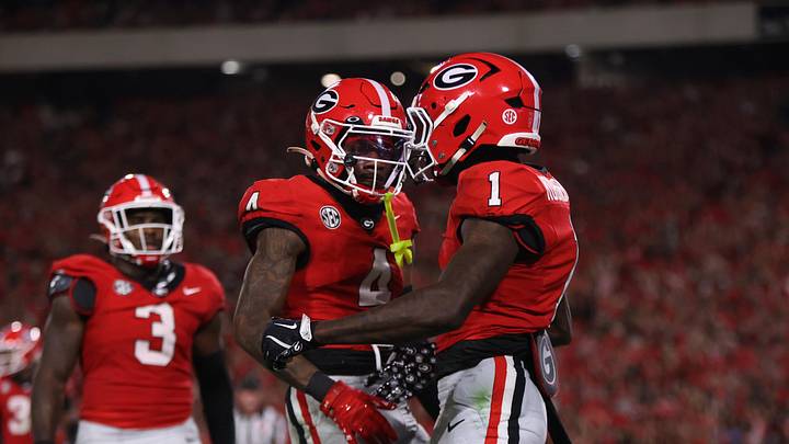 Sep 27, 2025; Athens, Georgia, USA; Georgia Bulldogs defensive back Ellis Robinson IV (1) and defensive back KJ Bolden (4) react in the first half against the Alabama Crimson Tide at Sanford Stadium. Mandatory Credit: Brett Davis-Imagn Images