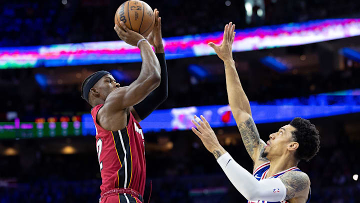 May 12, 2022; Philadelphia, Pennsylvania, USA; Miami Heat forward Jimmy Butler (left) shoots over