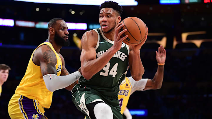 Feb 8, 2022; Los Angeles, California, USA; Milwaukee Bucks forward Giannis Antetokounmpo (34) moves the ball against Los Angeles Lakers forward LeBron James (6) during the second half at Crypto.com Arena. Mandatory Credit: Gary A. Vasquez-Imagn Images Feb 8, 2022; Los Angeles, California, USA; Milwaukee Bucks forward Giannis Antetokounmpo (34) moves the ball against Los Angeles Lakers forward LeBron James (6) during the second half at Crypto.com Arena. Mandatory Credit: Gary A. Vasquez-Imagn Images
