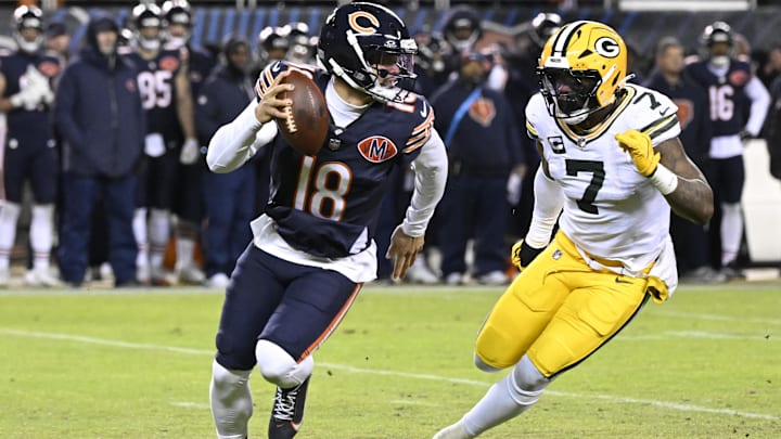 Caleb Williams with Packers linebacker Quay Walker in pursuit.