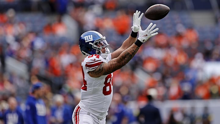 Oct 19, 2025; Denver, Colorado, USA; New York Giants tight end Theo Johnson (84) warms up before the game against the Denver Broncos at Empower Field at Mile High. 